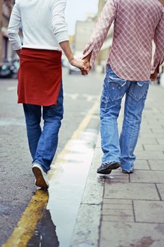 Creatas/Creatas/Getty Images Claiming your significant other on your taxes isn't easy.