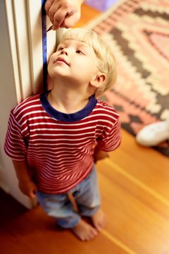 Ryan McVay/Photodisc/Getty Images Anticipating stock growth is like a parent excitedly waiting for a child to grow taller.