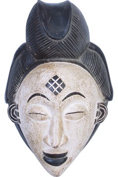 This mukudj mask represents the idealized female ancestor.