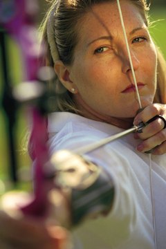 Comstock/Comstock/Getty Images Developing strong shoulder muscles can improve your archery performance.