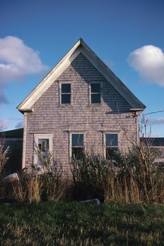 Hemera Technologies/Photos.com/Getty Images Using foreclosures as comps may cause housing prices to slip.