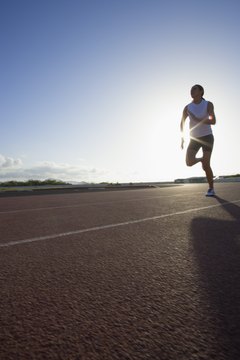 Polka Dot Images/Polka Dot/Getty Images Running requires both upper- and lower-body strength.