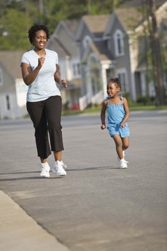 Jupiterimages/Comstock/Getty Images Jogging can be a family activity.