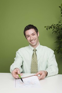 Jupiterimages/Brand X Pictures/Getty Images Refinancing without income requires some creativity.