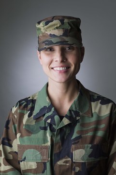Jupiterimages/Comstock/Getty Images Military personnel who borrow from their TSPs still need to repay their loans.