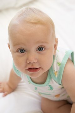Jupiterimages/Pixland/Getty Images Your diaper-wearing bundle of joy can also be a pile of expenses.