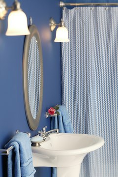 Comstock Images/Comstock/Getty Images Apartment essentials can add up in cost.
