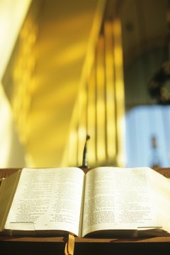 The priest may meet with the family to determine the best readings for the wake and funeral Mass.