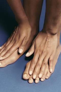 Polka Dot Images/Polka Dot/Getty Images Properly caring for nails can reduce splitting and breaking.