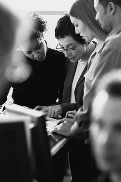 Ryan McVay/Photodisc/Getty Images The methods you use in behavior modification can affect the behaviors of others in the office.