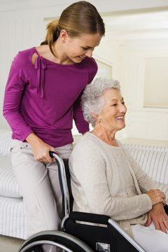 Jupiterimages/Pixland/Getty Images Teaching caregivers to use your equipment is part of the job of a home medical equipment delivery technician.