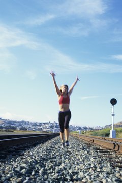 Kim Steele/Photodisc/Getty Images Running on gravel can add a challenge to your workout routine.