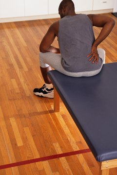 Keith Brofsky/Photodisc/Getty Images Inversion table exercises may help relieve back pain.