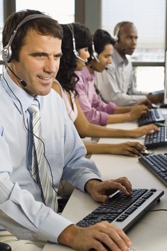 Jupiterimages/Pixland/Getty Images Co-workers in a multigenerational diverse office face issues related to communication and teamwork.
