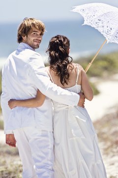 Jupiterimages/Polka Dot/Getty Images Before you get married, it's important to know what it will do to your tax returns.