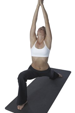 NA/PhotoObjects.net/Getty Images You can achieve firmer, more toned thighs through power yoga.