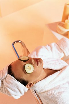 Creatas/Creatas/Getty Images Estheticians perform treatments to rejuvenate the skin.