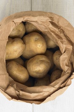 Jupiterimages/Creatas/Getty Images Like other starches, potatoes turn into sugar during digestion.