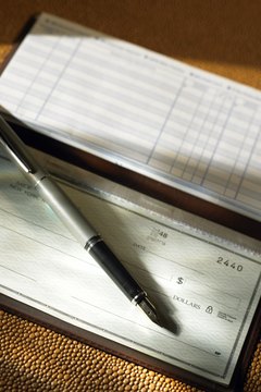 Creatas/Creatas/Getty Images With an interest bearing checking account, you can access your money when you need it.