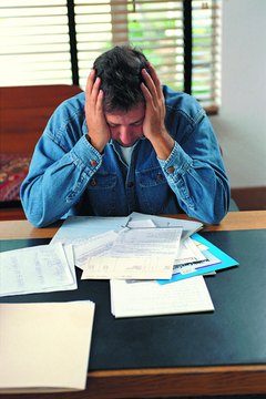 Photodisc/Photodisc/Getty Images That little overdraft can lead to big problems if you're not careful.
