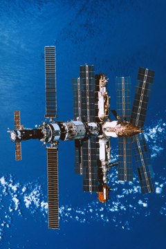 Stockbyte/Stockbyte/Getty Images Living on a space station can be cramped but exhilirating.