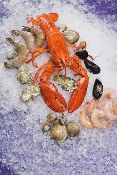 Comstock Images/Comstock/Getty Images Shellfish are excellent sources of vitamin B-12.
