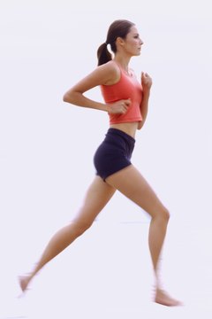 Stockbyte/Stockbyte/Getty Images Calf soreness is typical in those just taking up natural running.