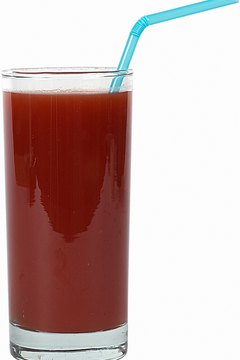 Zedcor Wholly Owned/PhotoObjects.net/Getty Images Juicing pomegranate is a delicious way to improve your heart health.