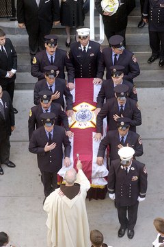 A Catholic funeral emphasizes the message of Christian salvation.