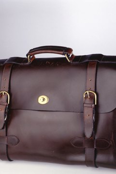 Photodisc/Photodisc/Getty Images Pick a briefcase that easily holds your personal documents while maintaing its shape.