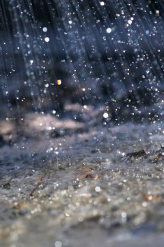 Acid rain, which can occur naturally or articifially, but changes the composition of rock.
