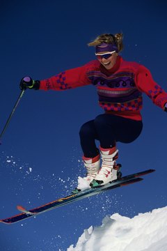 Karl Weatherly/Photodisc/Getty Images Ski jumping requires power and agility.