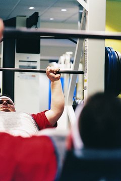Digital Vision./Digital Vision/Getty Images Strength-training reduces body fat.