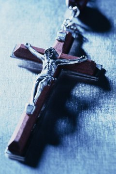 The cross symbolizes Jesus' crucifixion.