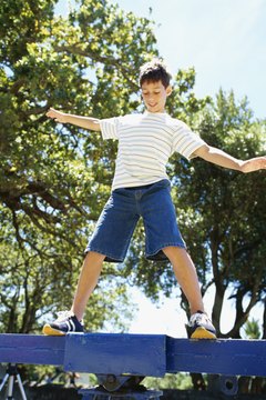 George Doyle/Stockbyte/Getty Images A balance board works like a seesaw that reacts to shifts in weight to reach equilibrium.