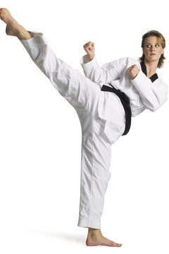 Photodisc/Photodisc/Getty Images Holding the side kick requires excellent balance.
