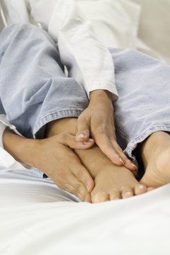 Medioimages/Photodisc/Photodisc/Getty Images Don't exacerbate foot pain with the wrong type of cardio.