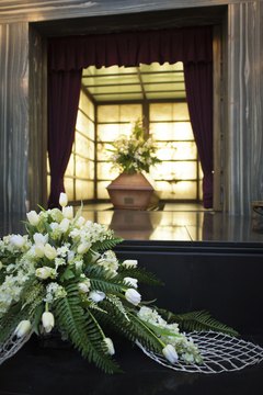 Funeral homes are responsible for embalming or cremating human remains.
