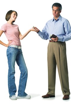 Photodisc/Photodisc/Getty Images Focus on income, debt and savings for financial self-sufficiency.