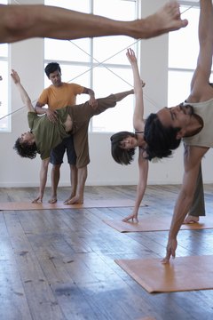 Thomas Northcut/Lifesize/Getty Images Improve fitness and performance with yoga oblique exercises.
