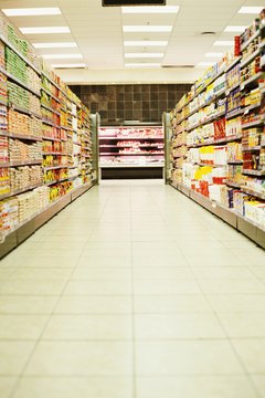 Ciaran Griffin/Stockbyte/Getty Images Supermarkets have enough shelf space to keep stock clerks busy for quite a while.