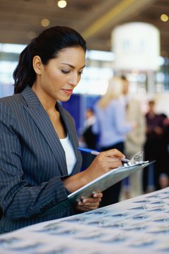 George Doyle/Stockbyte/Getty Images Quality system coordinators frequently work with auditors or perform audits.