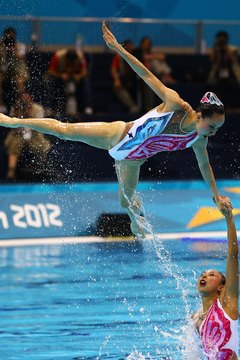 Al Bello/Getty Images Sport/Getty Images Spectacular lifts are a big part of synchonized swimming.