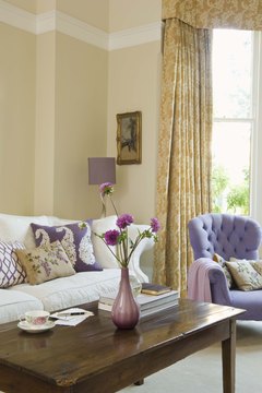 Jupiterimages/Polka Dot/Getty Images Tight budgets lead to eclectic homes that reflect their owners.