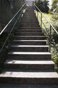 Hemera Technologies/AbleStock.com/Getty Images A flight of stairs is a convenient workout tool to help you burn fat.