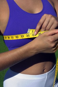 Thinkstock Images/Comstock/Getty Images Wear the right bra for measuring your chest.