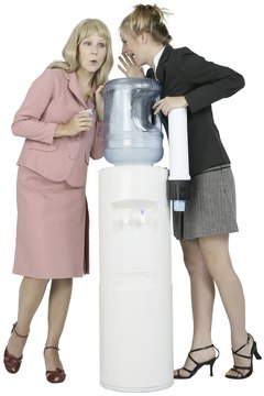 Photos.com/PhotoObjects.net/Getty Images Water cooler gossip is generally not considered to be defamation.