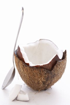 Martin Poole/Digital Vision/Getty Images Fresh coconut is refreshing and nutritious.
