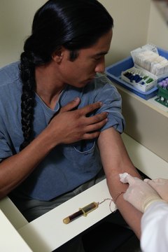 Keith Brofsky/Photodisc/Getty Images Doctors test potassium levels by doing a simple blood test.