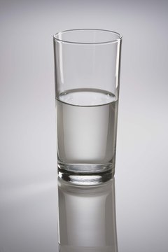 Jupiterimages/Comstock/Getty Images Drink plenty of water when taking fiber.